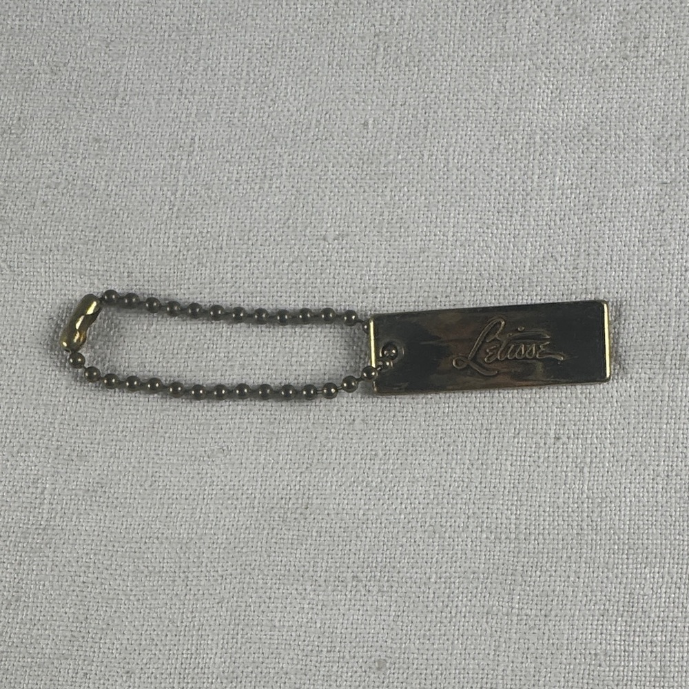 Letisse double sided gold bag charm tag